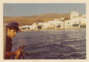 14 years old. The small fishing port of Gavrio in Andros. Carefully setting up the next shot.